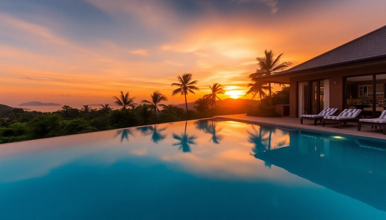 Stunning view of Phuket real estate featuring a luxury villa by the pool at sunset.